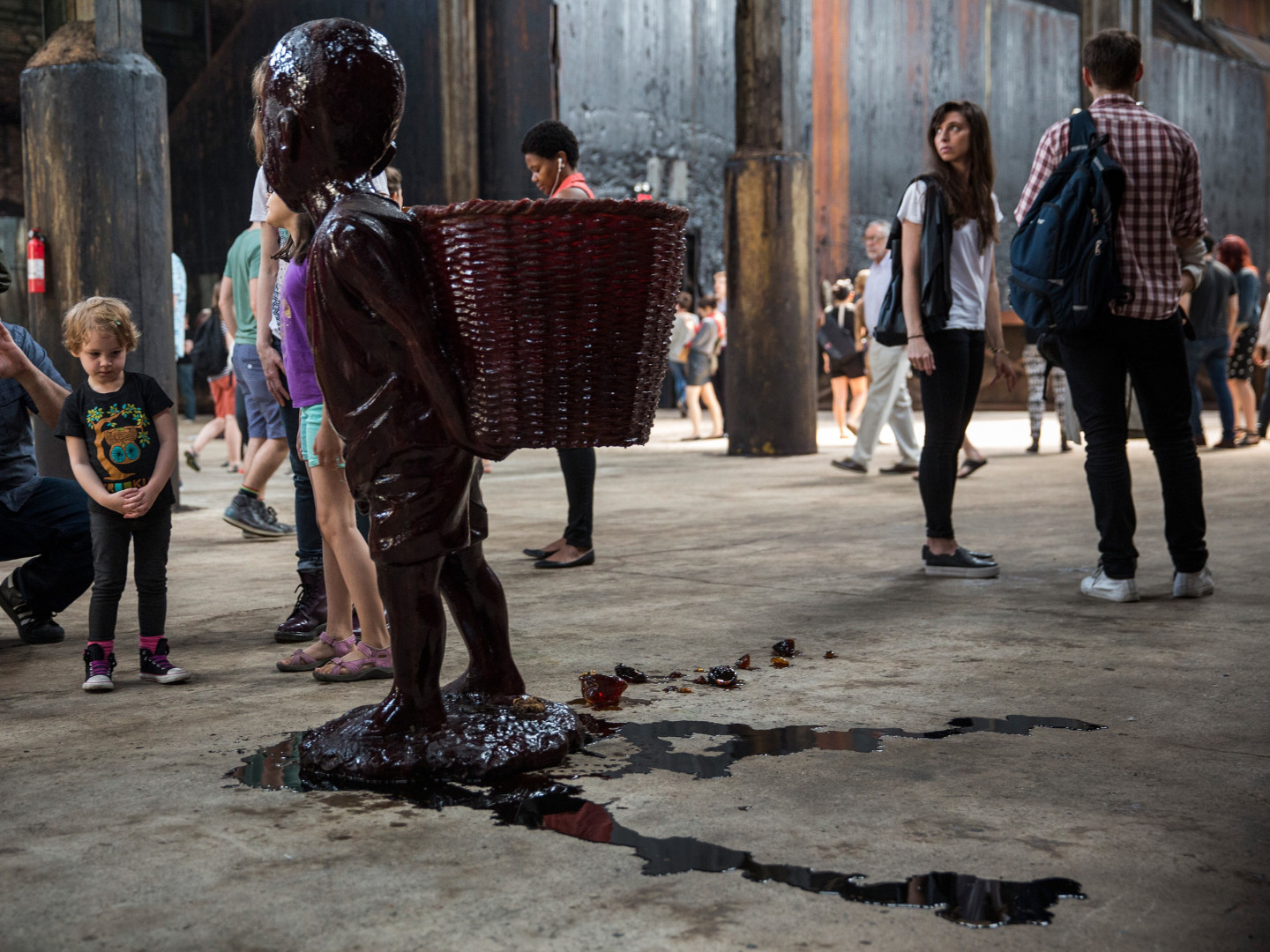 Walker's candy boy sculptures started melting fast in the non-climate-controlled factory, and the result looks a lot like blood