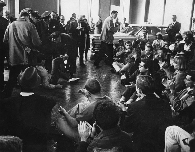 1964 sit-in at a Cadillac dealer in San Francisco; Photo by Jeffrey Blankfort