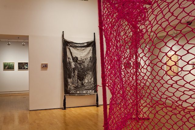 Installation shot: Foreground: L.J. Roberts. <i>We Couldn’t Get In. We Couldn’t Get Out.</i>, 2006-2007. Midground: <i>Gay Bashers Come And Get It</i>, 2011. Courtesy of the artist.