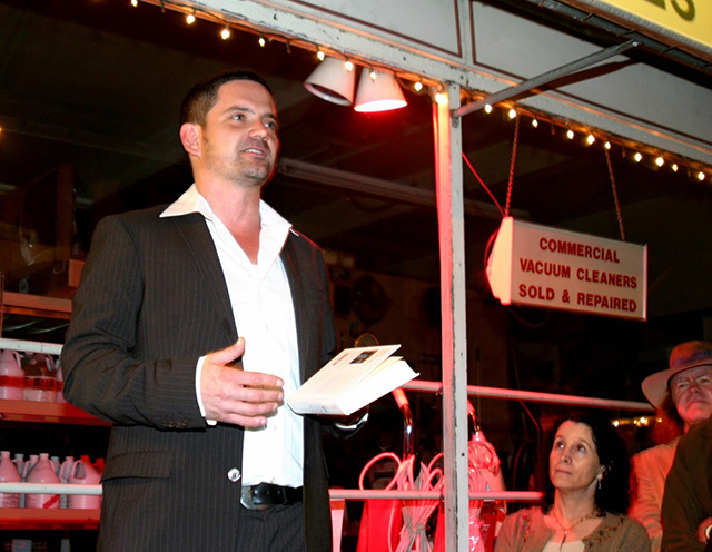 The scene from the first Lit Crawl in 2004, when the reading was held outside the Phoenix Bar because employees wouldn't turn the televisions off. Courtesy of Litquake