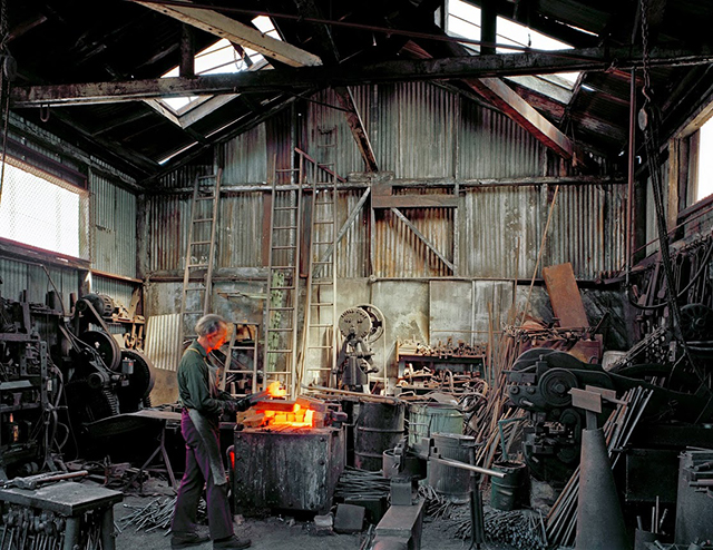  Johnny Ryan, Blacksmith, Klockar's Blacksmith and Metal Works, 443 Folsom Street, 1980. Photo by Janet Delaney