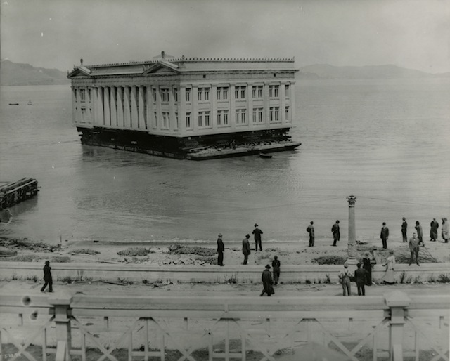 Deconstruction of the Panama-Pacific International Exposition - Ohio Building being floated to Coyote Point, 1916. Courtesy California Historical Society.