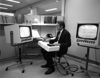 Bill English, Engelbart's lead engineer, testing the first mouse.