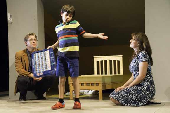Max (Jonah Broscow) teaches his parents (Teddy Spencer and Elise Youssef). (Photo: Mark Palmer)