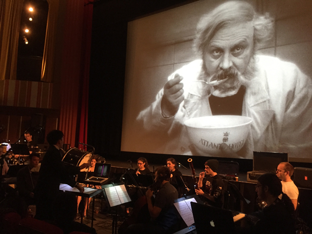 The Berklee Silent Film Orchestra rehearsing its new score to F.W. Murnau's <i>The Last Laugh</i>, Coolidge Corner Theatre, Brookline, Mass. (Courtesy of Berklee College of Music)