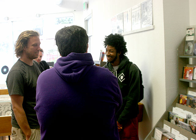 Andrew Nosnitsky, James Laurence and Squadda talk shop at Park Blvd. Records & Tapes in Oakland. 