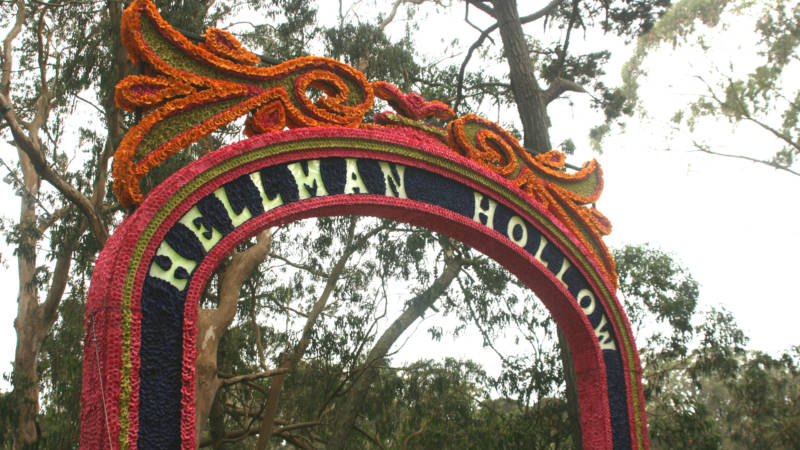 A sign honoring Hardly Strictly Bluegrass founder Warren Hellman at Outside Lands, Aug. 9, 2015. (Photo: Gabe Meline/KQED)
