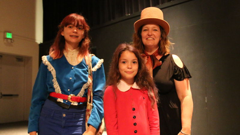 The Martins, L to R: Sophia, Ella and Tawnya, who dressed up for the Primus & the Chocolate Factory show