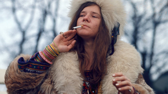 Janis Joplin smoking a cigarette in Denmark.