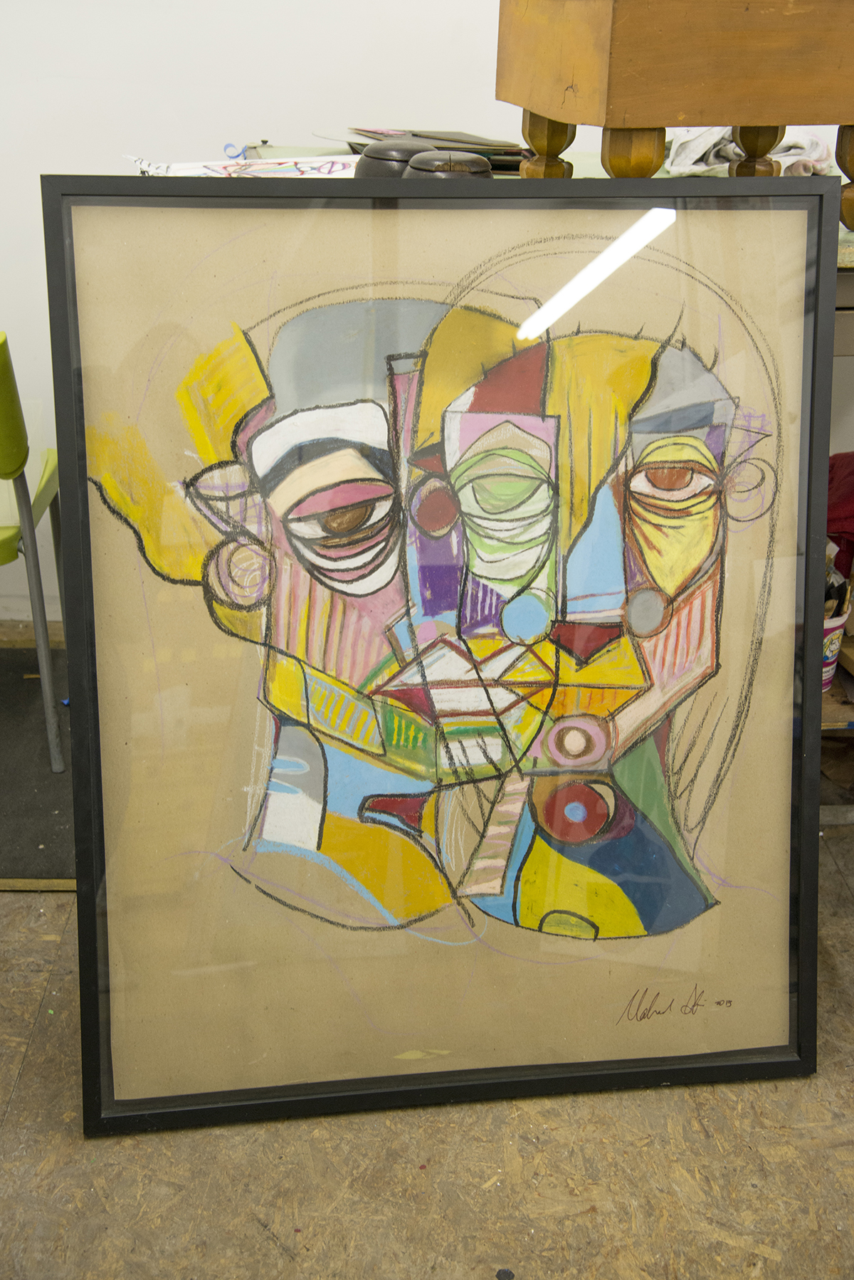Framed work on paper in Tesfai's studio.