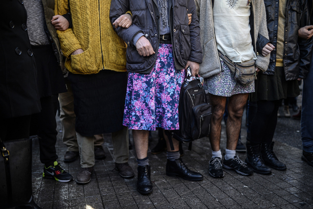 Turkish men wearing skirts demonstrate in Istanbul, to support women's rights in memory of 20-year-old Ozgecan Aslan.