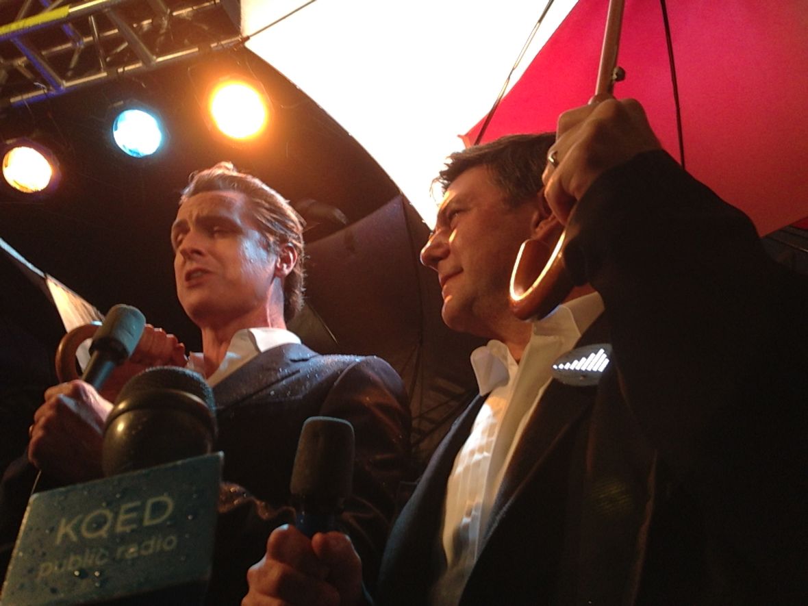 Lieutenant Governor Gavin Newsom (left) joined Leo Villareal to turn on the Bay Lights in March of 2013 under rainy skies