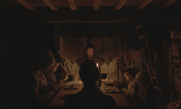 Dinner table prayer in The Witch; Courtesy A24 Films.