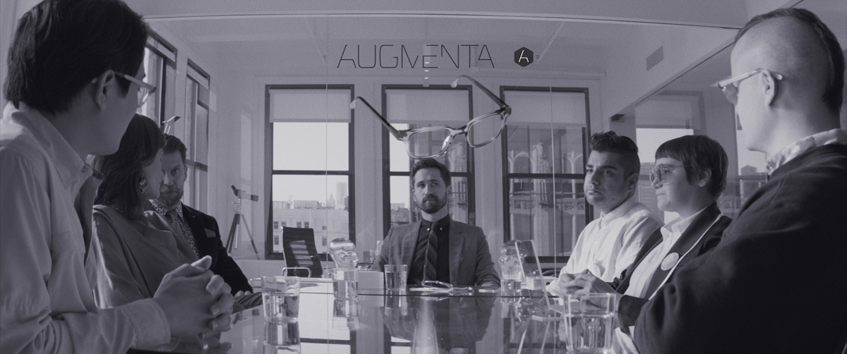 Benjamin Dickinson at center, pitching a campaign strategy to Augmenta in 'Creative Control,' a Magnolia Pictures release.