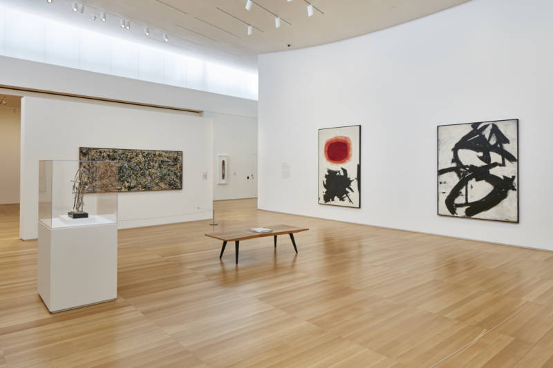 A room at Stanford's Anderson Collection. From left to right: "Timeless Clock," by David Smith (1957); "Lucifer" by Jackson Pollack (1947); "Transfiguration III" by Adolph Gottlieb (1958); and "Figure 8" by Franz Kline (1952).