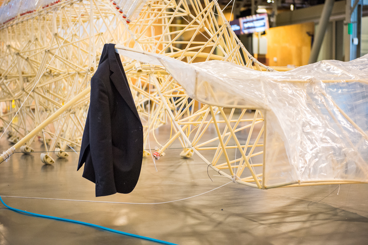 Jansen's signature suit jacket during installation at the Exploratorium.