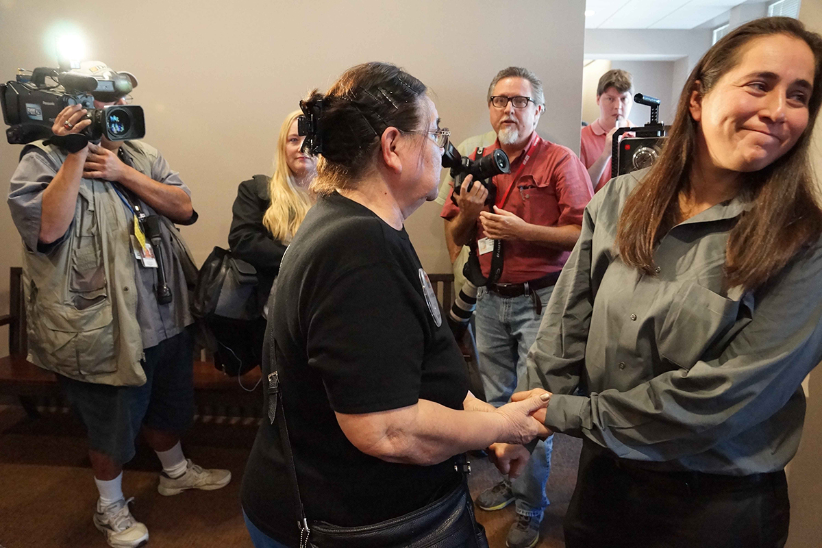 Anna Vasquez (R) with mother Maria Vasquez at San Antonio Hearings when the three remaining defendants were released.