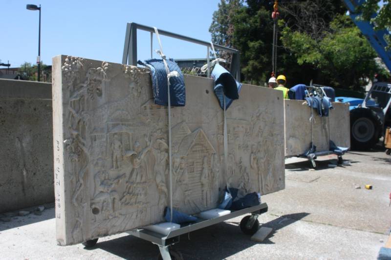 A panel by artist Ruth Asawa is removed from a fountain in Courthouse Square in Santa Rosa.