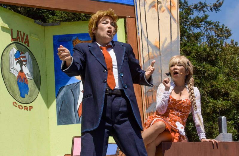 An orange haired character resembling Donald Trump is in the San Francisco Mime Troupe's new show 'Schooled'