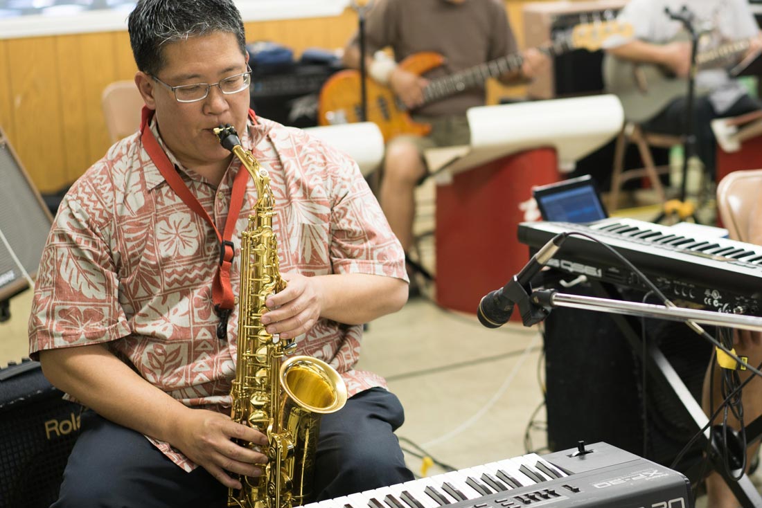Chidori Band director Michael Yoshihara rehearses in San Jose's Japantown before a series of performances at Obon festivals in different cities.