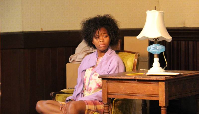 Cookie (Chaz Shermil) tries to understand the chaos around her in Unbuntu Theater Project's 'Hurt Village.'