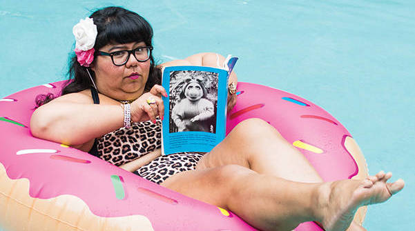 Author and activist Virgie Tovar relaxes in a swimming pool