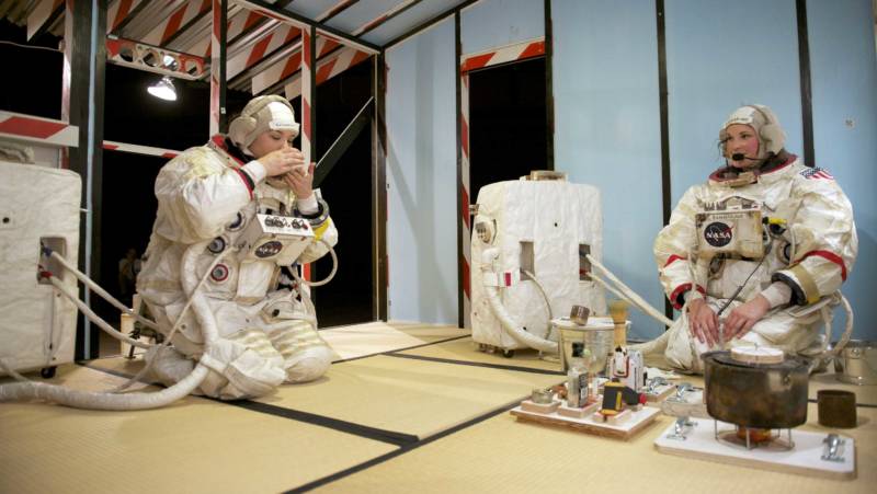 The astronauts perform a tea ceremony on Europa in Tom Sachs' 'Space Program: Europa' at YBCA.