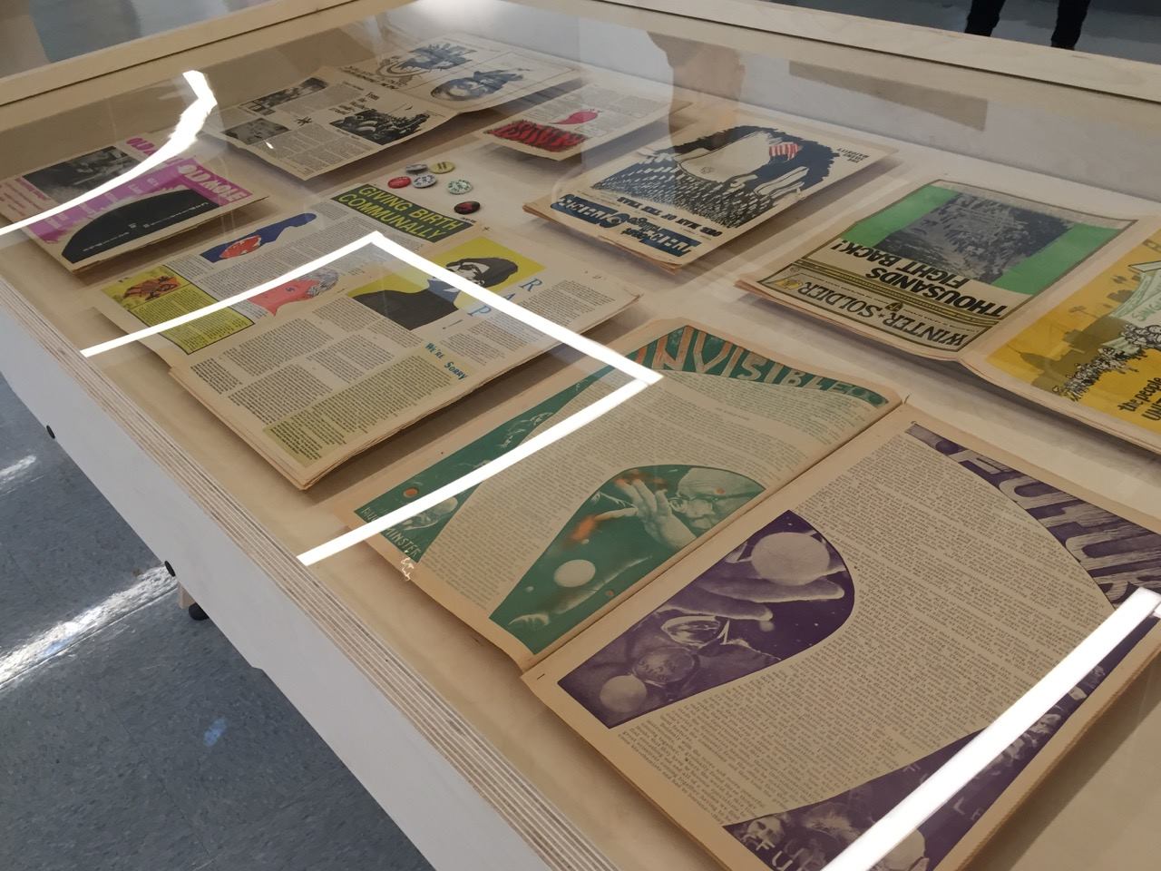 Counterculture newspapers on display as part of the Revolution Times exhibit. 