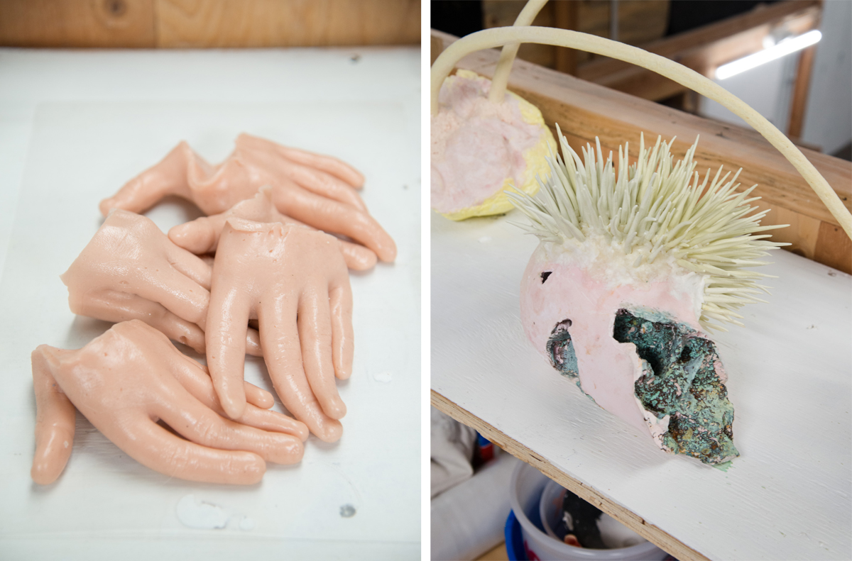 The cast rubber hands; a smaller sculptural work in the studio (L–R).
