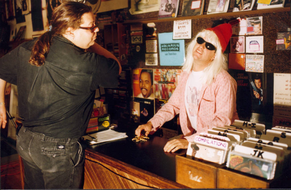 Ray Wilcox and Chris Enright in a scene set at an old Aquarius Records location