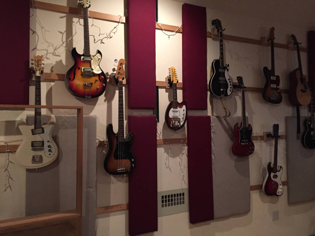Guitar wall in Decibelle Recording Studio