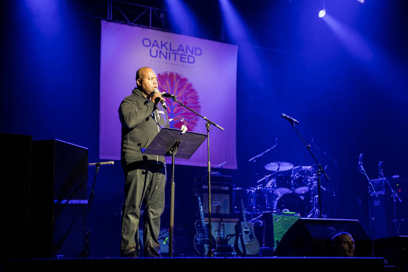 Glynn Washington speaks at the Oakland United benefit at the Fox Theater on Dec. 14, 2016. 