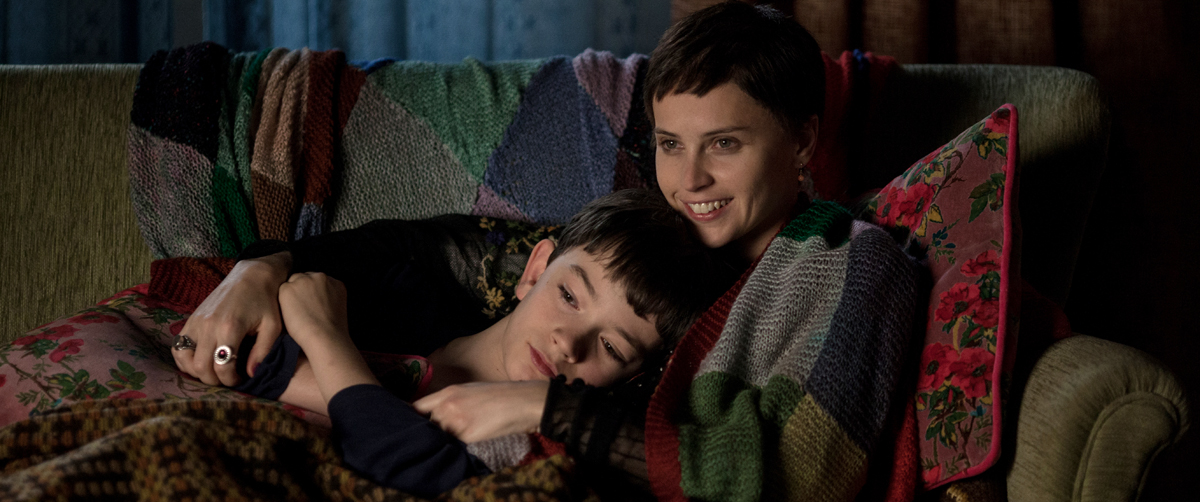 Lewis MacDougall (left) stars as Conor and Felicity Jones (right) stars Mum in director J.A. Bayona’s 'A Monster Calls.'