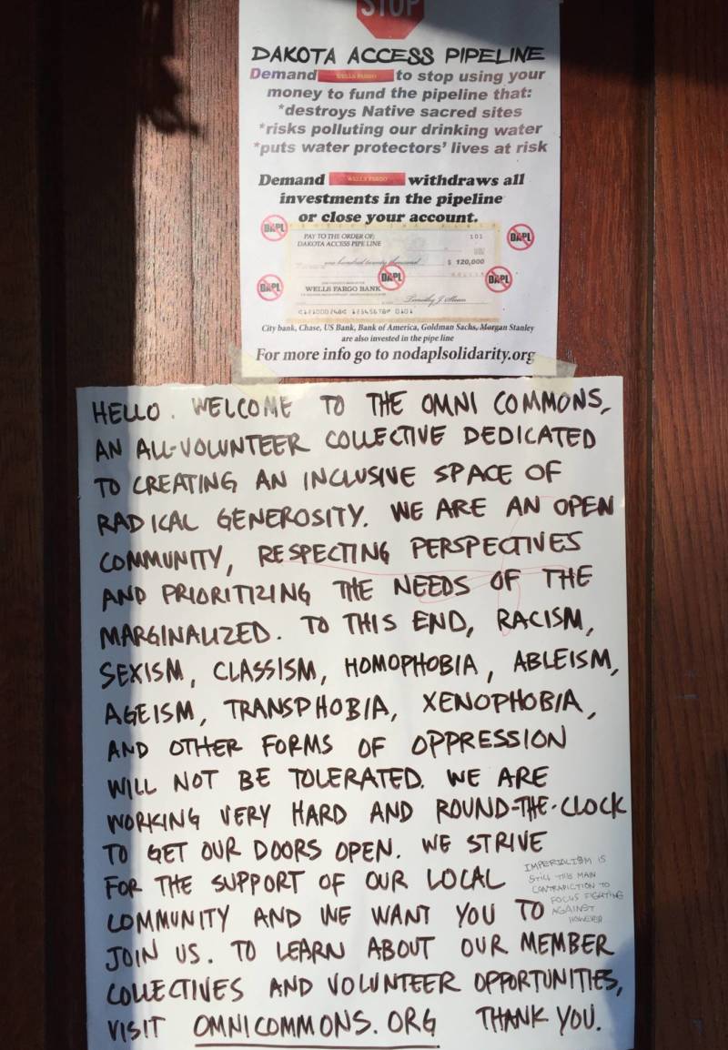 A welcome sign at the Omni Commons collective in North Oakland