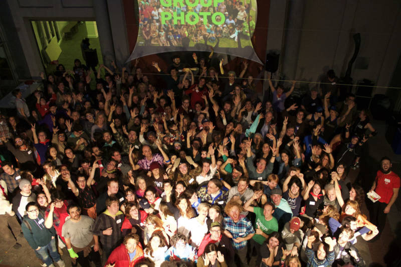A crowd poses for a photo during Power Hour.