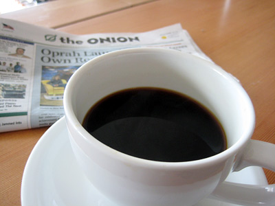 cup of coffee with the ONION