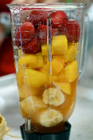 blender with fruit for smoothie
