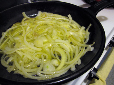 Saute onions in skillet seasoned with olive oil