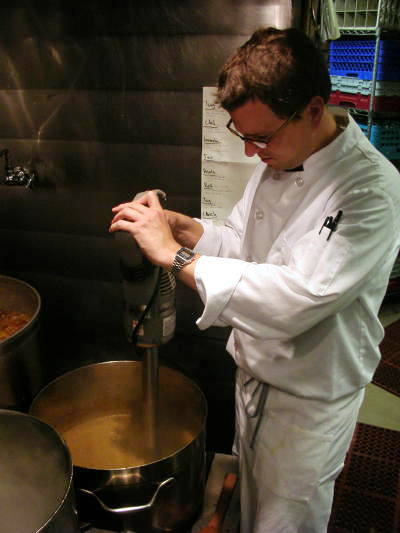 Brian Murphy, a sous chef at Oliveto, mixes up lentils for one of his signature soups.