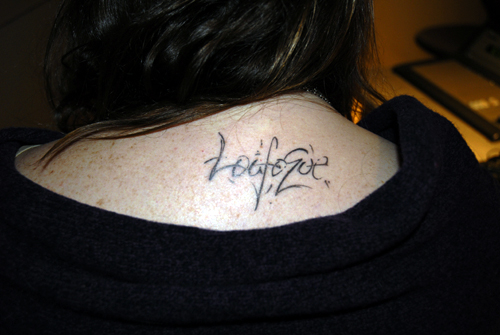 Julie Powell tattoo Loufoque which translates from French to English meaning wild and crazy