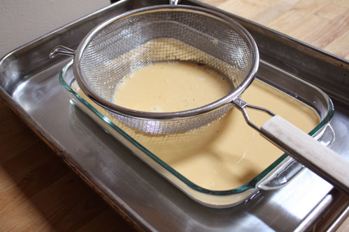 Butterscotch pudding through sieve