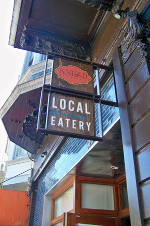 Street sign for the restaurant and bakery housed in one space. Photo: Serena Bartlett.