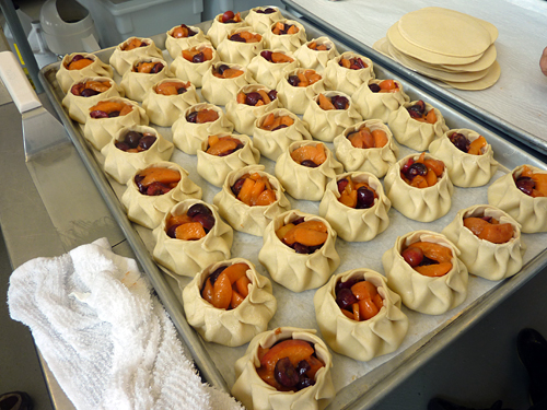 Tray of apricot and cherry tarts