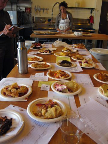 With 20 pies on the table, Judge Patricia Hewitt has got to take careful notes.