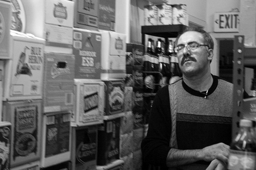 Yousef Elhaj, corner store owner, in his San Francisco shop. Image: Katherine Bruens, 2009
