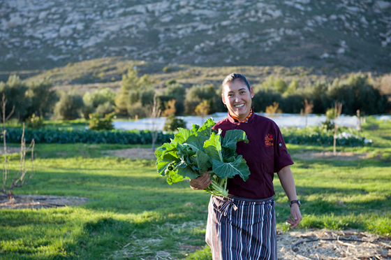 La Cocina que Conta chef Denise Roa in the ranch's organic garden. Photo: Lynne Harty