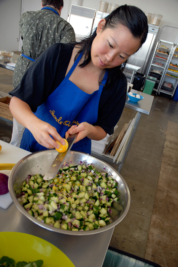 Jenny prepping salad. Photo: Wendy Goodfriend