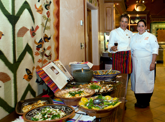 Romney Steele and cooking school chef Gabriela Lopez Alvarez survey the results of students work. Photo: Lynne Harty