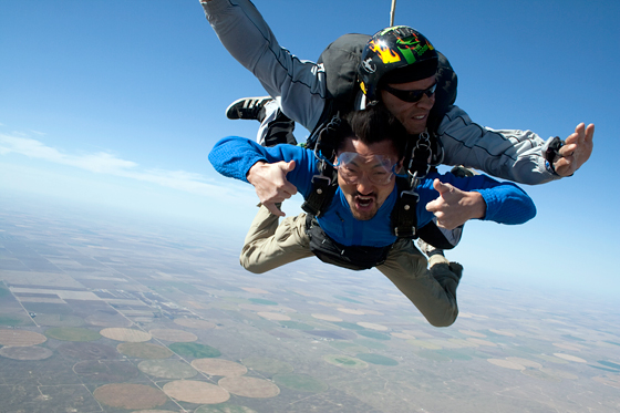 Host Yul Kwon skydiving in America Revealed. Photo: Courtesy of Lion Television