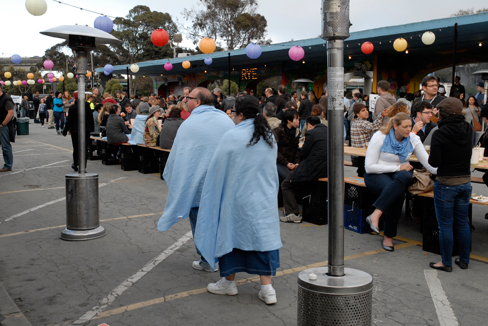 Night Market patrons wearing Snuggie-like attire. Photo: Wendy Goodfriend